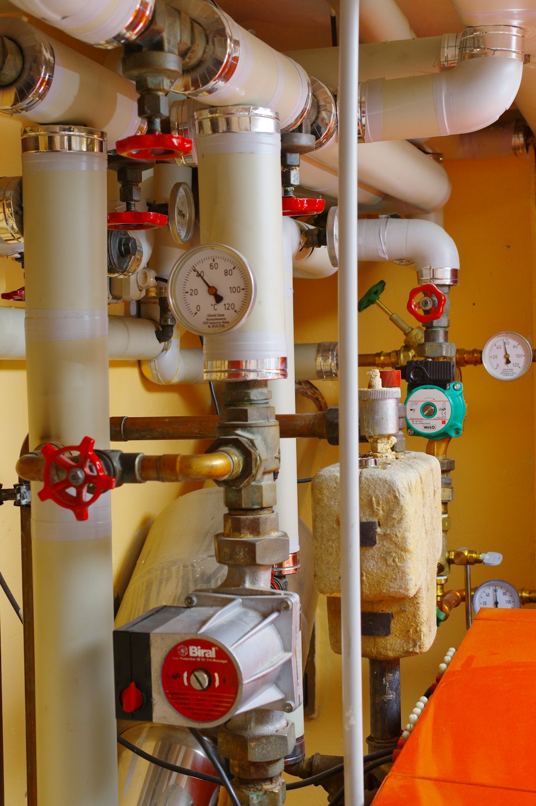 a-room-with-a-bunch-of-pipes-and-gauges-2nsqwypu6tw